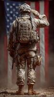 Soldier saluting in front of an American flag during a tribute ceremony in a military base at dawn photo
