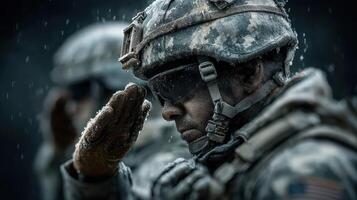 Soldiers in winter gear salute during a snowstorm at a military training site in the early morning hours photo