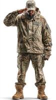 Military personnel saluting while wearing camouflage uniform and cold weather gear in studio setting photo