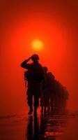 Soldiers saluting during sunset in a dramatic orange landscape near a battlefield photo