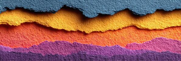 Colorful layers of torn paper create an artistic abstract landscape in vibrant hues photo
