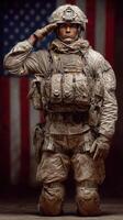 Soldier in combat gear saluting in front of a large American flag during an emotional military tribute photo