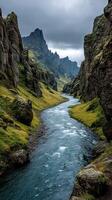 Majestic Icelandic landscape showcasing river flowing through rugged cliffs under a cloudy sky photo