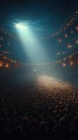 Crowded theater illuminated by spotlight with a mysterious ambiance photo