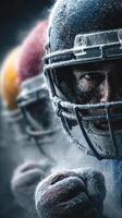 Intense close-up of a football player in action during a snowy match, showcasing determination and focus photo