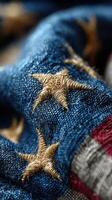 Close-up view of golden stars on a blue fabric with red and white accents showcasing patriotic design details photo