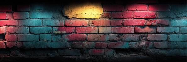 Colorful graffiti on urban brick wall illuminated with bright lights at night photo