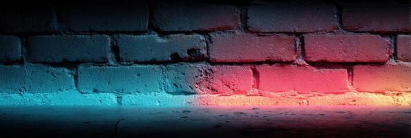 Colorful lighting illuminates a textured brick wall in a creative studio setting during the evening hours photo