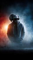 Elephant-headed figure in hoodie and headphones stands in dramatic foggy setting with contrasting lights photo