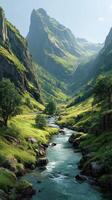 Majestic river flowing through lush green valleys surrounded by towering mountains during a bright sunny day photo