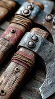 Rustic axes displayed on a wooden surface, showcasing craftsmanship and vintage details in a workshop setting photo