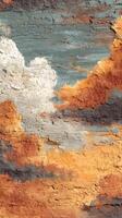 Beautiful textured sky with vibrant orange, gray, and white clouds during sunset in a serene landscape photo