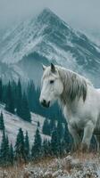 Majestic white horse stands on a snowy mountain meadow surrounded by towering peaks and evergreen trees photo