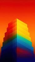 Colorful geometric structure rises against a vibrant sunset sky with layered hues of red, orange, and yellow photo
