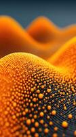 Intricate patterns of orange droplets on a dark surface create a visually striking abstract design photo