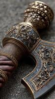 Ornate battle axe with intricate detailing resting on textured surface in soft light photo