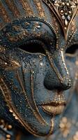 Intricate blue and gold mask showcasing detailed craftsmanship with cultural significance in an artistic display photo