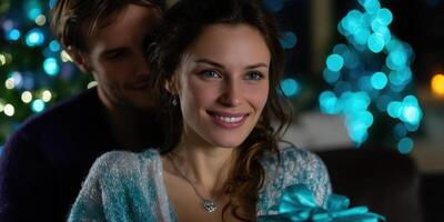 Couple enjoying a cozy evening together while preparing for a festive celebration with beautifully wrapped gifts photo