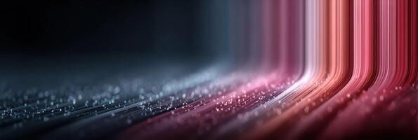 Vibrant light waves and droplets create an abstract visual experience in a dark setting photo