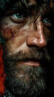 Intense portrait of a rugged man with scars showcasing resilience and character in a dramatic setting photo