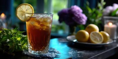 Refreshing iced tea drink served with lemon in a cozy indoor setting with flowers and lemons photo