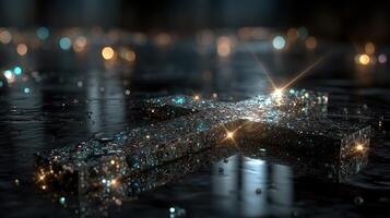 Reflective crystal cross on wet surface with shimmering lights in a moody setting at dusk photo