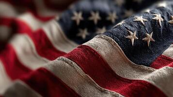 Waves of a tattered American flag displayed during a commemorative event in a patriotic atmosphere photo