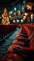Elegant theater seating with festive decorations highlighting a beautiful Christmas tree in the background during the holiday season photo