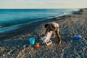 Fisherman Preparing The Chair For A Day At The Sea photo