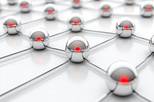 A group of silver spheres with red dots photo