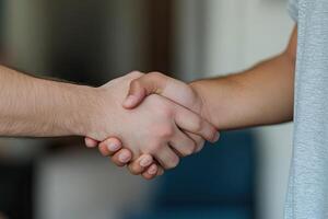 A handshake between two people photo