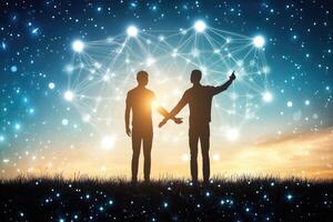 Two figures standing together, connected by a network of light and stars photo