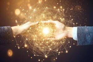 Two hands holding a luminous network sphere photo