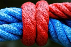 Close-up of intertwined ropes, red and blue photo