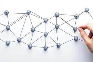 A hand is holding a network of dots photo