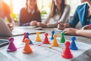 Team brainstorming session. Colorful game pieces on a shared document photo