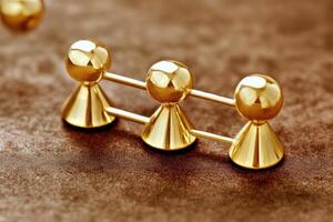 Gold figures linked in a row photo