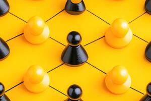 A group of black and yellow chess pieces on a yellow background photo