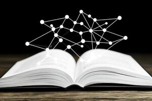 Open book with network graphic overlay photo