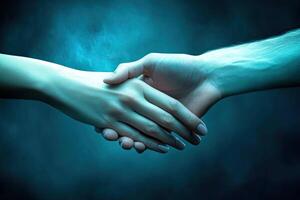Two hands clasped in ethereal connection photo
