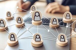 Network of people connecting over a laptop photo