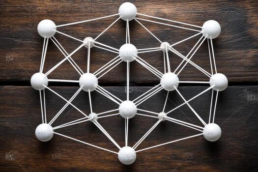 A white mesh structure with many spheres on it photo