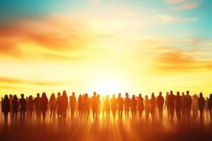Massive crowd walking towards golden sunrise photo