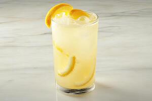 Refreshing, light drink garnished with lemon slices photo