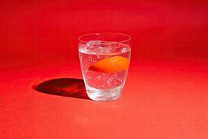 Refreshing citrus drink in a glass photo