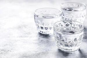 Clear glasses of water photo