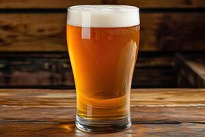 Light amber beer in a tall glass photo