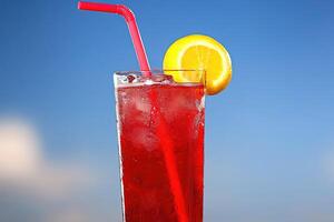 Refreshing red drink with lemon photo