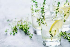 Refreshing thyme and lemon drinks photo