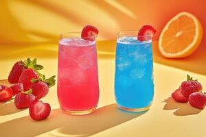 Vibrant pink and blue cocktails adorned with fresh strawberries photo